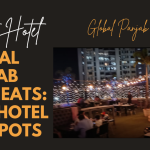 A photo showcasing the interior of Global Punjab Pune, highlighting the blend of colorful dhaba-inspired décor with modern, elegant table settings.